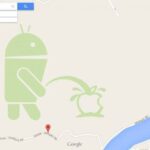 android mijando no logo da apple