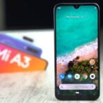 Xiaomi Mi A3 ao lado de sua caixa.